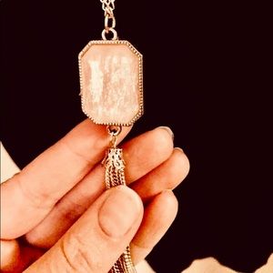 18” long beautiful rose gold necklace.